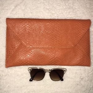 ** 3 for $15* Large clutch